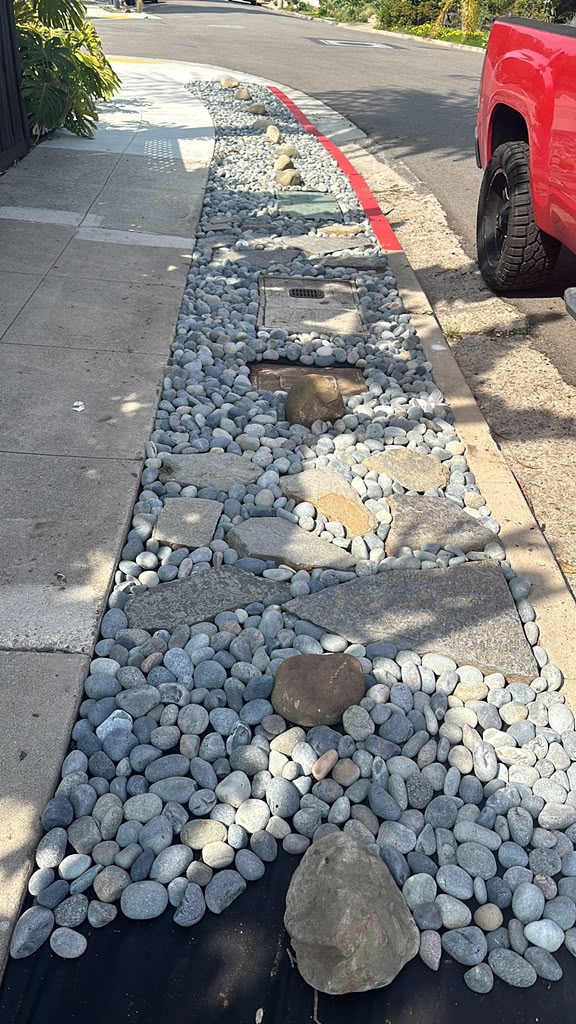 Jardinera de piedra de río